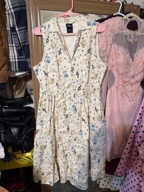 Disney Cream Sleeveless Dress with Blue & Yellow Musical Motifs